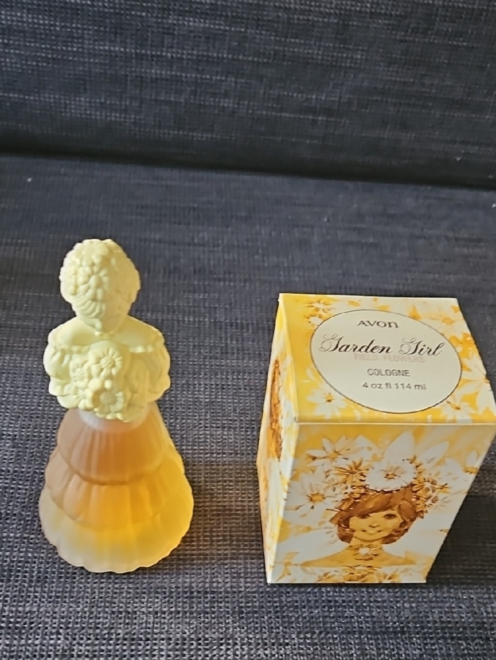Avon Garden Girl Yellow Field Flowers Cologne Figurine